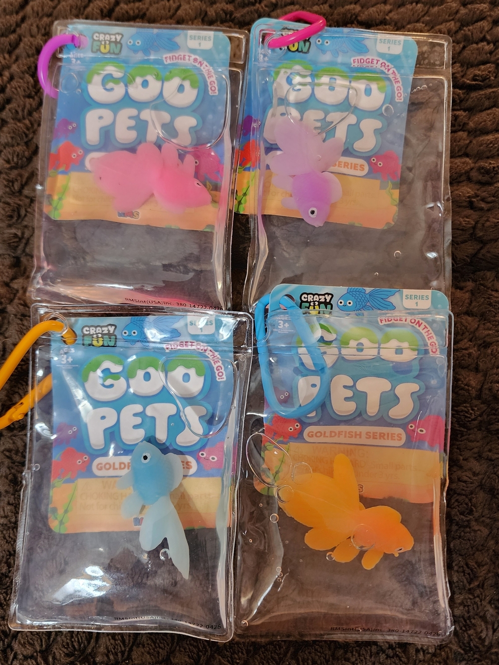 Goo Pets Goldfish Keychain - Pink, Purple, Blue, Orange.